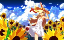 Hanee Baram standing in a sunflower field