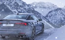 parked audi in winter
