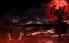 Itachi sitting on pole