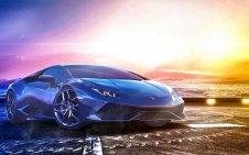 blue LAMBORGHINI Huracan Parked By The Sea At Sunset