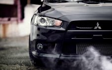 Mitsubishi with smoke
