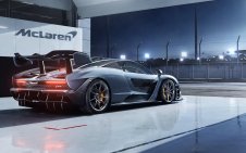 McLaren parked with Headlights on