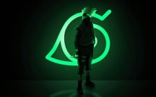 Cool Ninja Kakashi Standing In Front Of A Konoha Logo