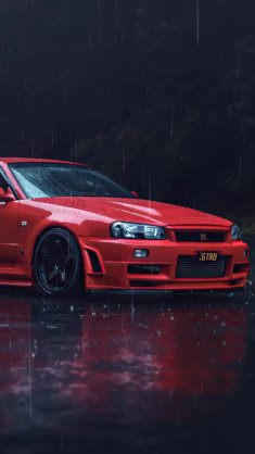 red nissan parked on the road under the rain live wallpaper