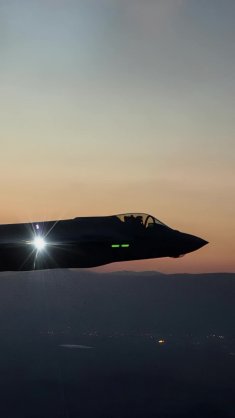 f-35 fighter jet at sunset live wallpaper