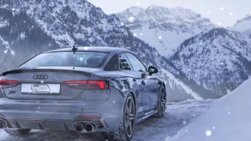 parked audi in winter live wallpaper